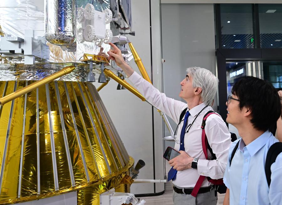 Guests visit the show room of the Deep Space Exploration Laboratory in Hefei, east China's Anhui Province, Jul. 7, 2025. (Photo/Xinhua)